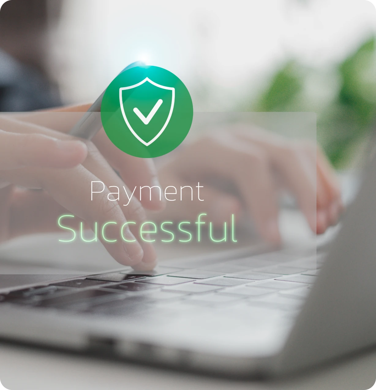 Payment successful confirmation on laptop screen.