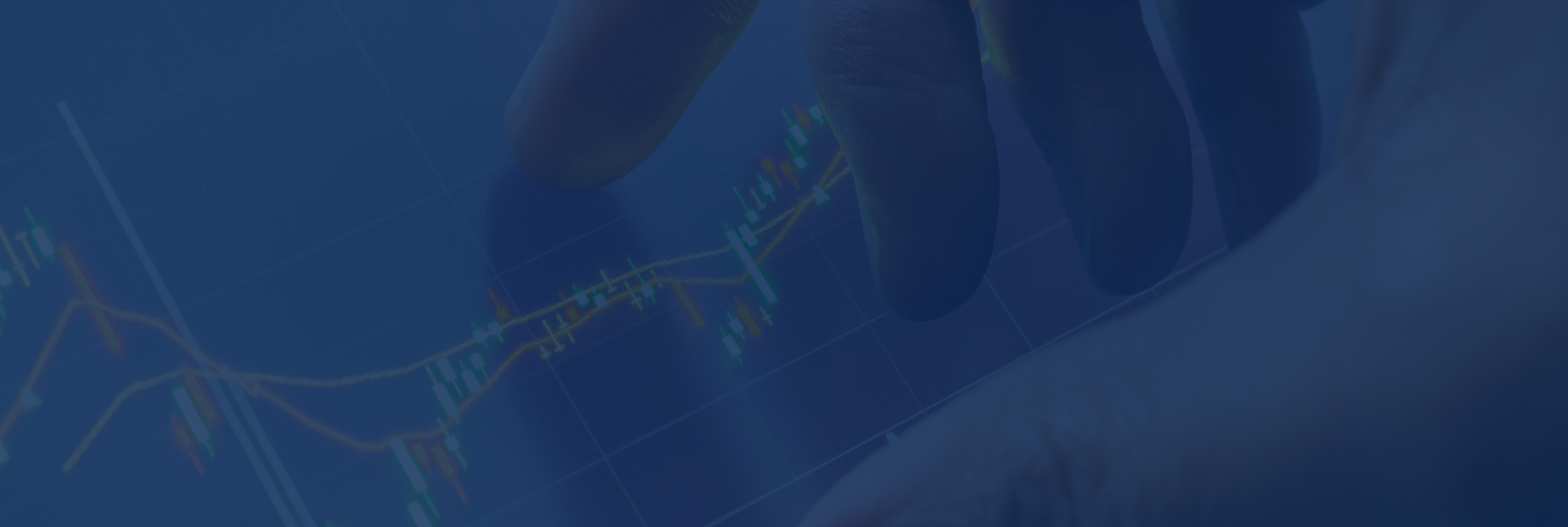 Hand interacting with financial graph on screen.