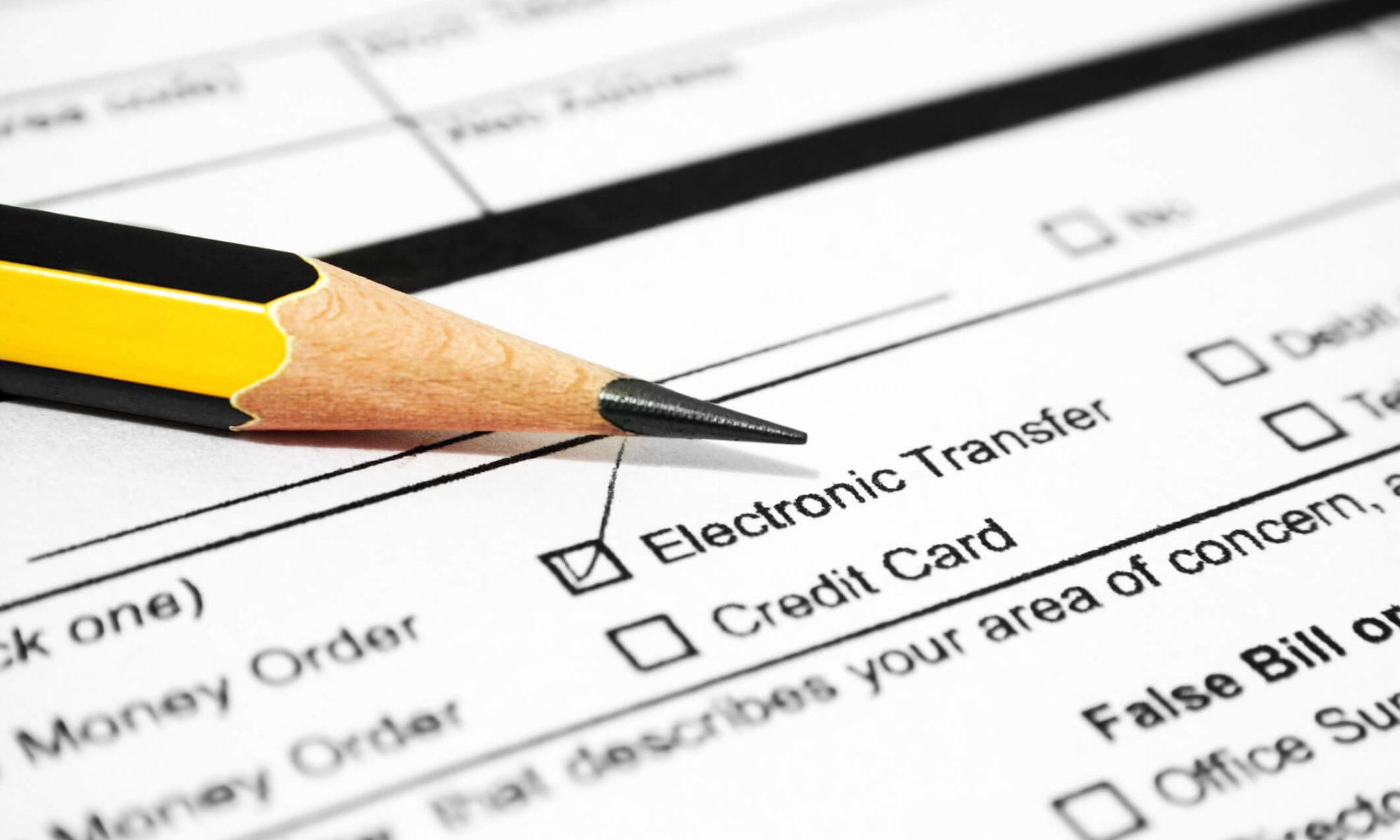 Pencil on form with electronic transfer option.